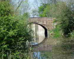 wilmoorway bridge in water - T&S Canal